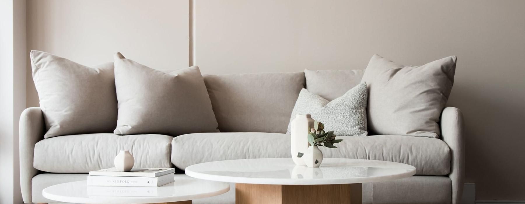 a white couch with a coffee table